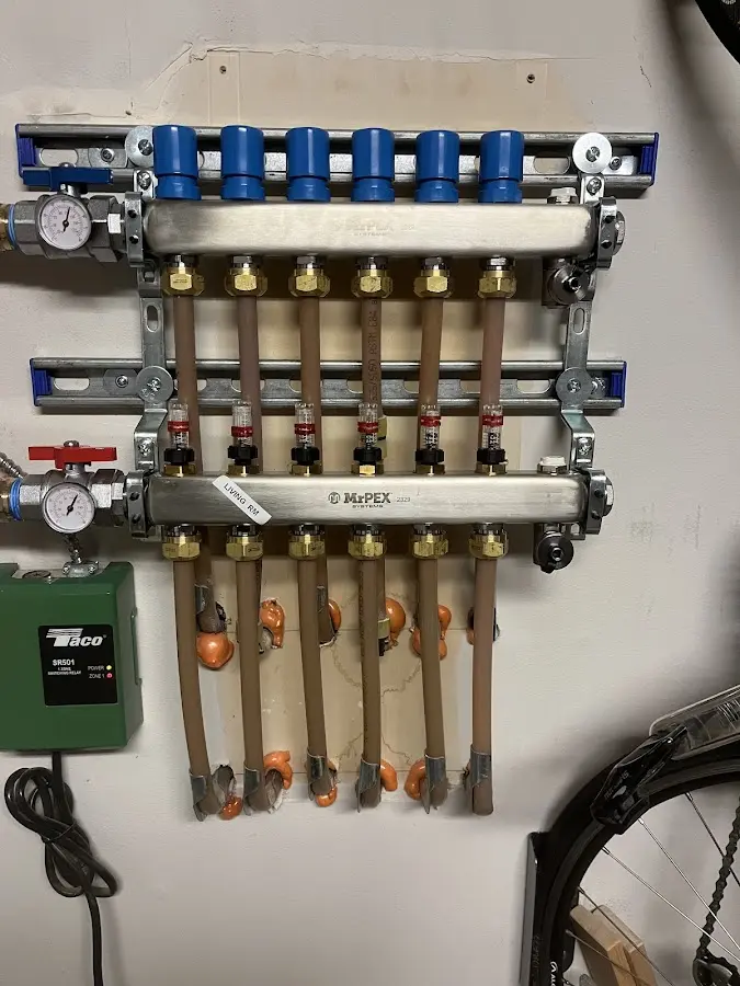 Plumber performing Sink Repair at a residential property in Cambridge